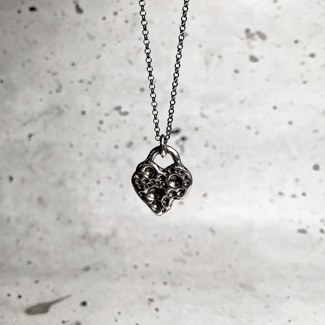 holey heart pendant