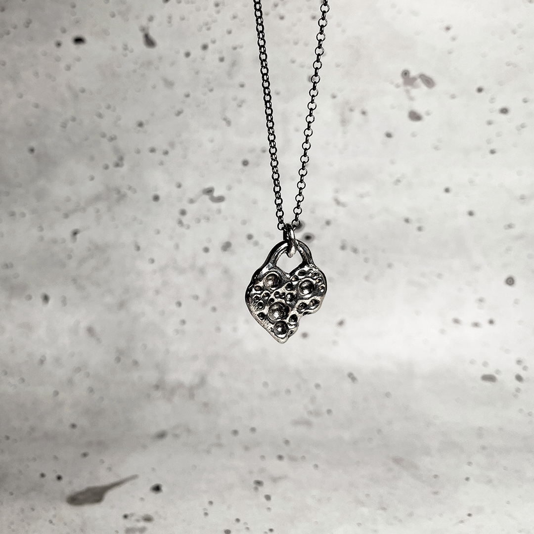 holey heart pendant